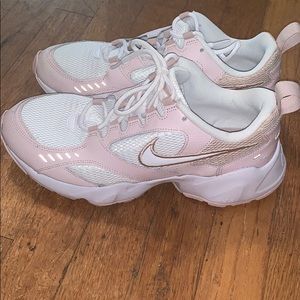 Pink and white chunky Nike shoes